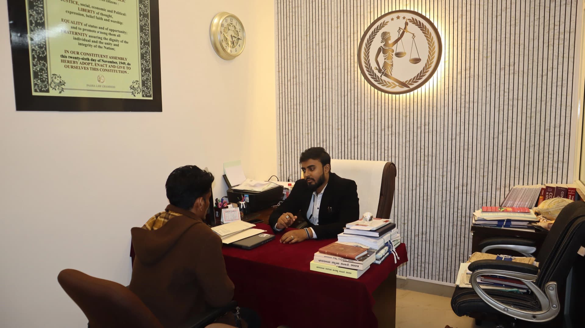 An advocate in consultation at the Pasha Law Chambers office